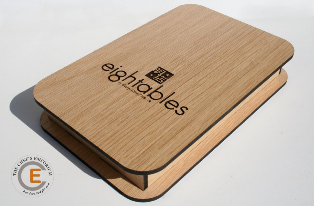 Engraved wooden bill presenter.