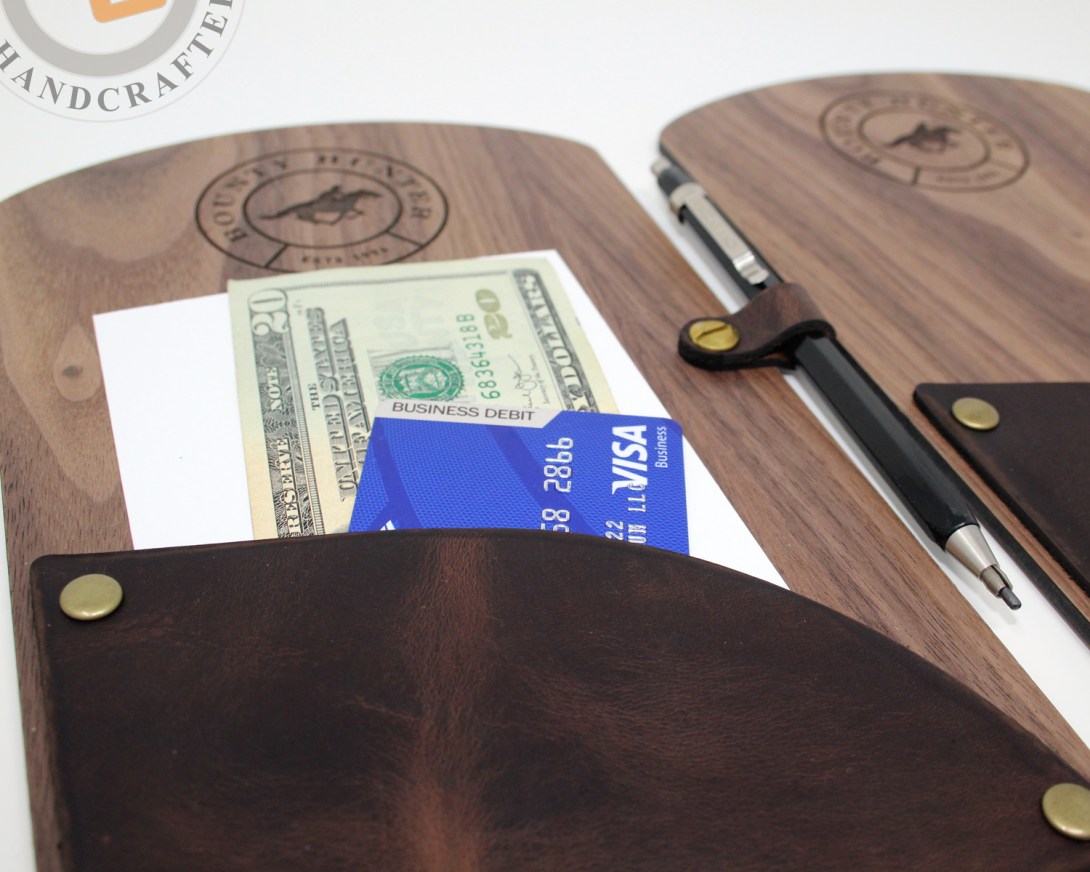 Custom crafted wood and leather restaurant bill presenter.